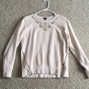 Pink sweater with jewels on neckline